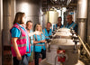Adnams tour guests inside the distillery