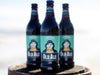 Adnams Old Ale Bottles on the beach