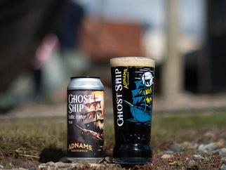 Ghost Ship Baltic Porter pictured at Southwold Harbour in can and in a Ghost Ship pint glass.