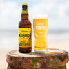 Pint of Adnams Kobold English Lager with Bottle on the Beach 