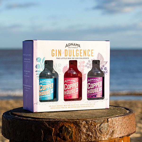 lifestyle shot of a gift box with three mini gins
