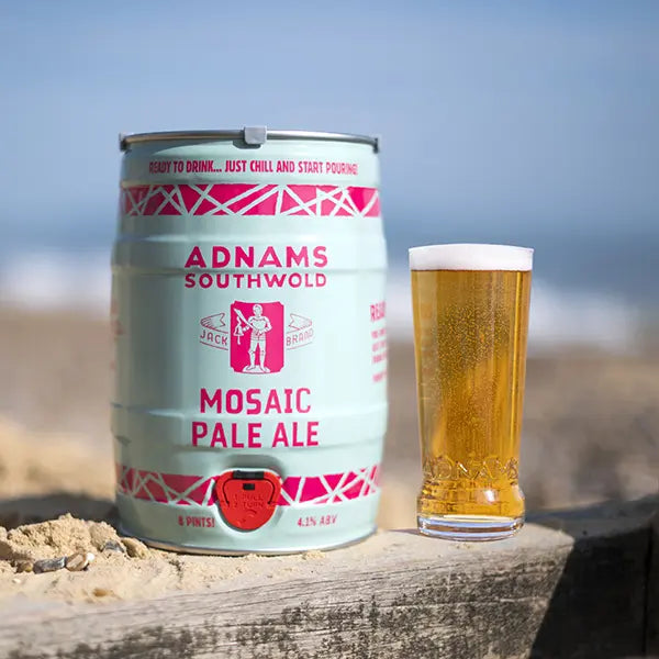 Adnams Mosaic Pale Ale Mini Keg on the beach with a pint of Mosaic Pale Ale